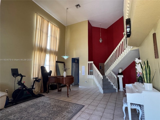 17088 NW 19th St, Pembroke Pines, FL 33028 - entryway with a high ceiling, stairway, and tile patterned flooring
