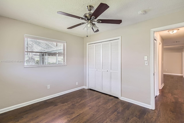 1708 NW 84th Dr, Coral Springs, FL 33071 - unfurnished bedroom featuring dark wood-type flooring, a closet, ceiling fan, and a textured ceiling