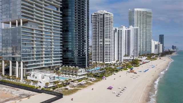 18555 Collins Ave Unit 4605, Sunny Isles Beach, FL 33160 - view of building exterior with a skyline view and view of water and beach