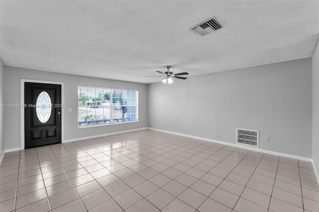 22226 SW 62nd Ave, Boca Raton, FL 33428 - entryway with a textured ceiling, ceiling fan, and light tile patterned flooring