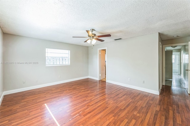 22226 SW 62nd Ave, Boca Raton, FL 33428 - empty room featuring wood finished floors, a ceiling fan, and a textured ceiling