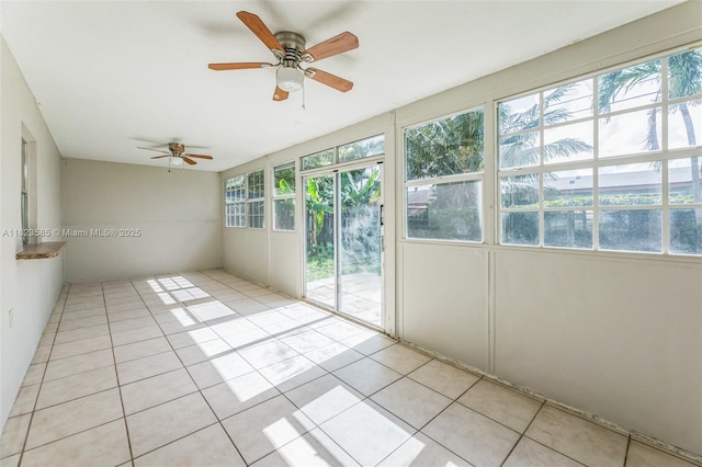 22226 SW 62nd Ave, Boca Raton, FL 33428 - unfurnished sunroom with plenty of natural light and tile patterned floors