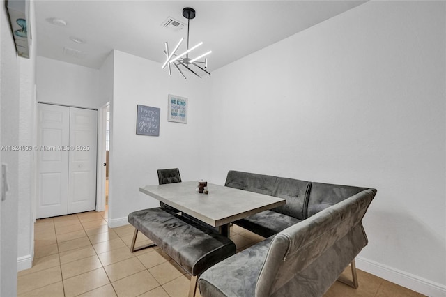 11854 SW 27th St, Miramar, FL 33025 - dining space featuring a chandelier and light tile patterned floors