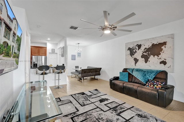 11854 SW 27th St, Miramar, FL 33025 - living area featuring light tile patterned floors, a ceiling fan, a chandelier, and recessed lighting