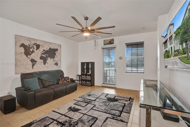 11854 SW 27th St, Miramar, FL 33025 - tiled living room featuring ceiling fan and baseboards