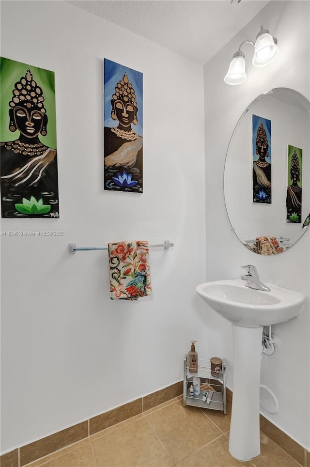 11854 SW 27th St, Miramar, FL 33025 - bathroom with tile patterned flooring and baseboards
