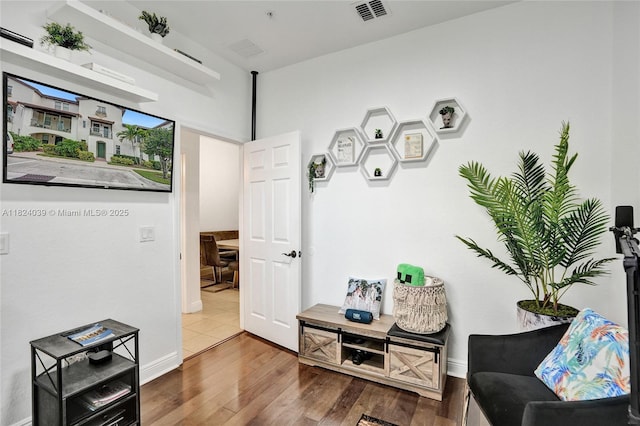 11854 SW 27th St, Miramar, FL 33025 - living area featuring wood finished floors and baseboards
