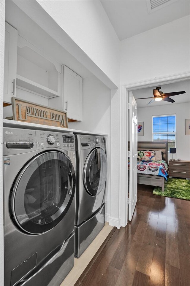 11854 SW 27th St, Miramar, FL 33025 - laundry area featuring washing machine and clothes dryer, cabinet space, hardwood / wood-style floors, and ceiling fan