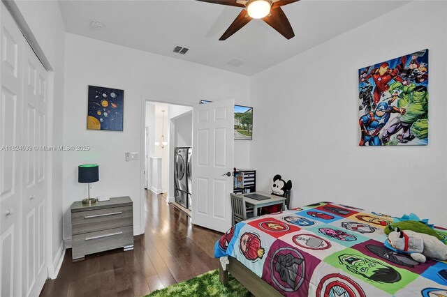 11854 SW 27th St, Miramar, FL 33025 - bedroom featuring dark wood-type flooring, estacked washer and dryer, and ceiling fan