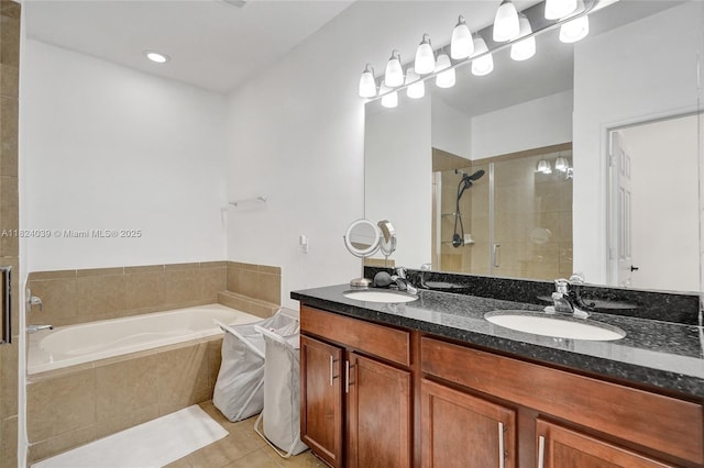 11854 SW 27th St, Miramar, FL 33025 - bathroom featuring a bath, a stall shower, tile patterned floors, and double vanity