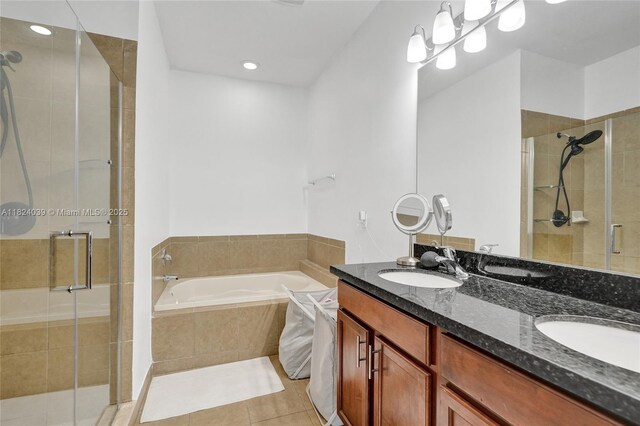 11854 SW 27th St, Miramar, FL 33025 - bathroom featuring a garden tub, a shower stall, double vanity, tile patterned floors, and recessed lighting