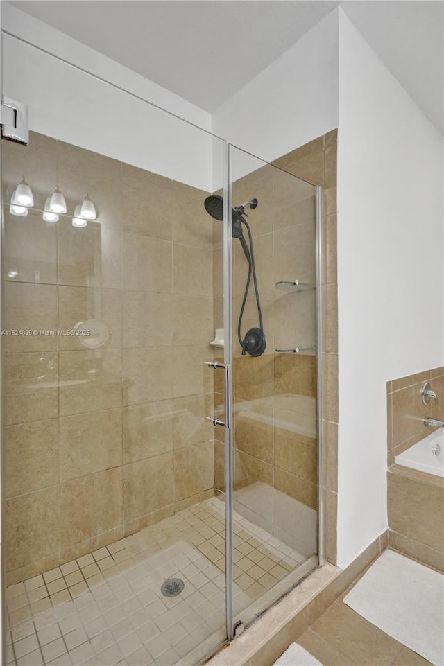 11854 SW 27th St, Miramar, FL 33025 - full bath with a shower stall, a garden tub, and tile patterned flooring