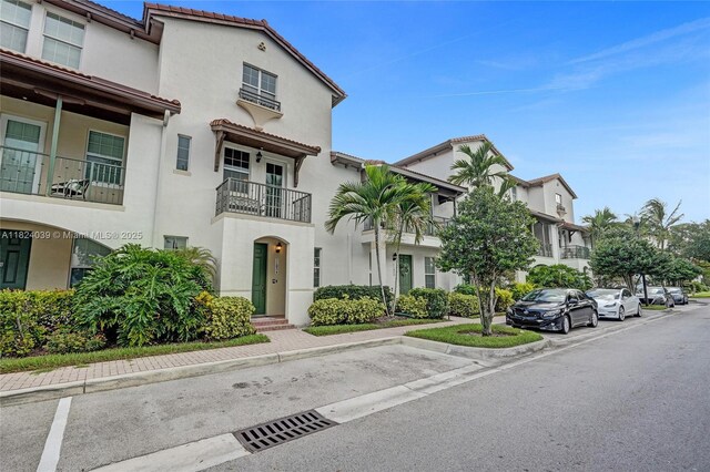 11854 SW 27th St, Miramar, FL 33025 - view of front of property featuring stucco siding and a tiled roof