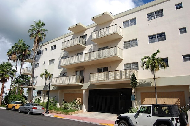 701 Euclid Ave Unit 403, Miami Beach, FL 33139 - view of apartment building / complex featuring a garage