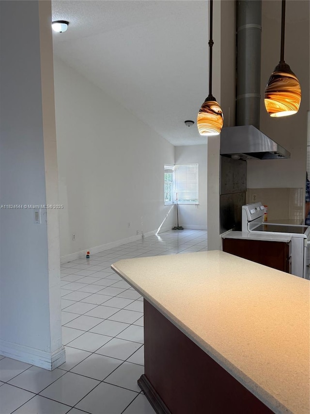 651 NW 134th Ave, Miami, FL 33182 - kitchen featuring electric range, light tile patterned floors, light countertops, hanging light fixtures, and range hood
