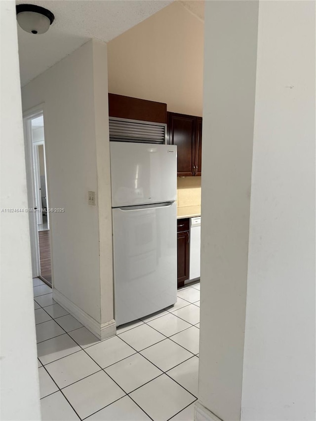 651 NW 134th Ave, Miami, FL 33182 - corridor featuring light tile patterned floors and baseboards