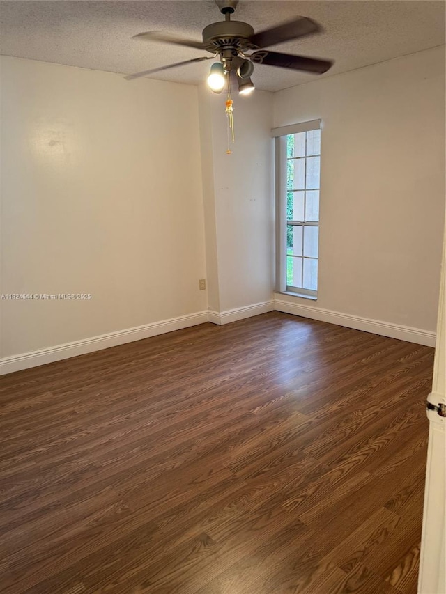 651 NW 134th Ave, Miami, FL 33182 - empty room featuring a ceiling fan, a textured ceiling, and dark wood-type flooring