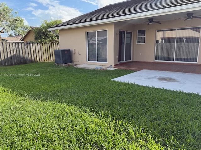 651 NW 134th Ave, Miami, FL 33182 - rear view of property with a ceiling fan, stucco siding, and a patio area