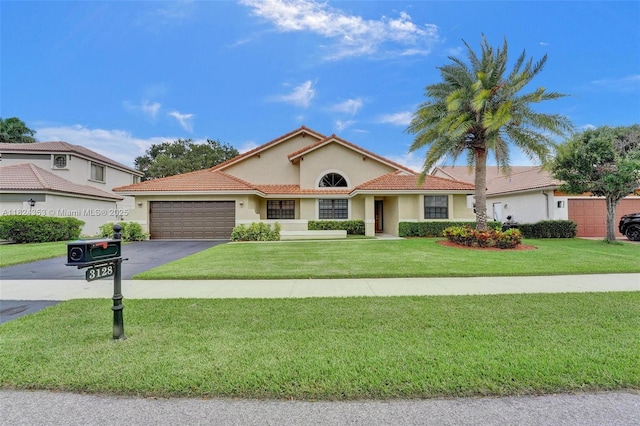 3128 Peachtree Cir, Davie, FL 33328 - mediterranean / spanish-style house featuring stucco siding, driveway, an attached garage, a front yard, and a tile roof