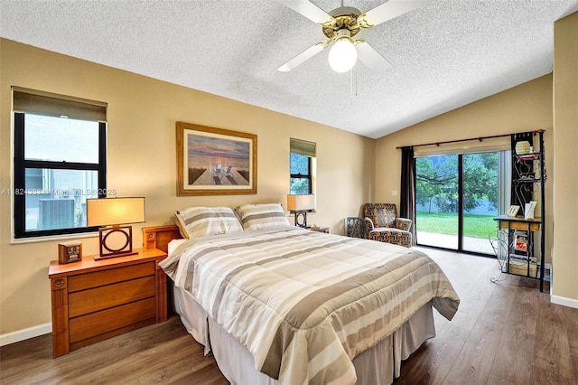 3128 Peachtree Cir, Davie, FL 33328 - bedroom with access to outside, vaulted ceiling, wood finished floors, a textured ceiling, and a ceiling fan