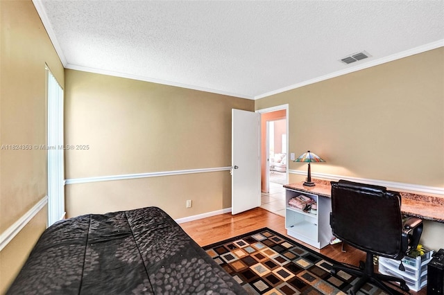3128 Peachtree Cir, Davie, FL 33328 - home office with crown molding, wood finished floors, and a textured ceiling