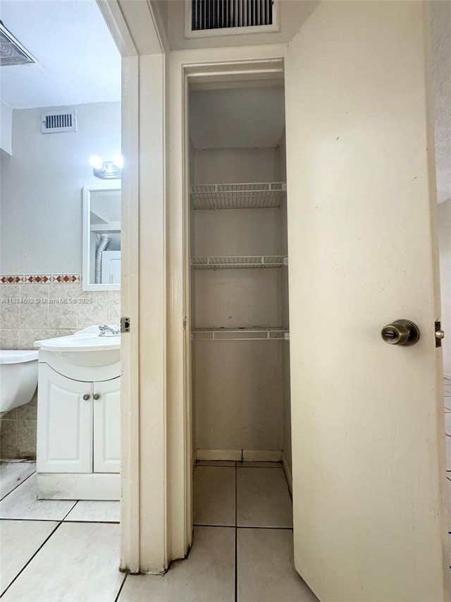 2562 NW 52nd Ave Unit B18, Lauderhill, FL 33313 - closet featuring a sink