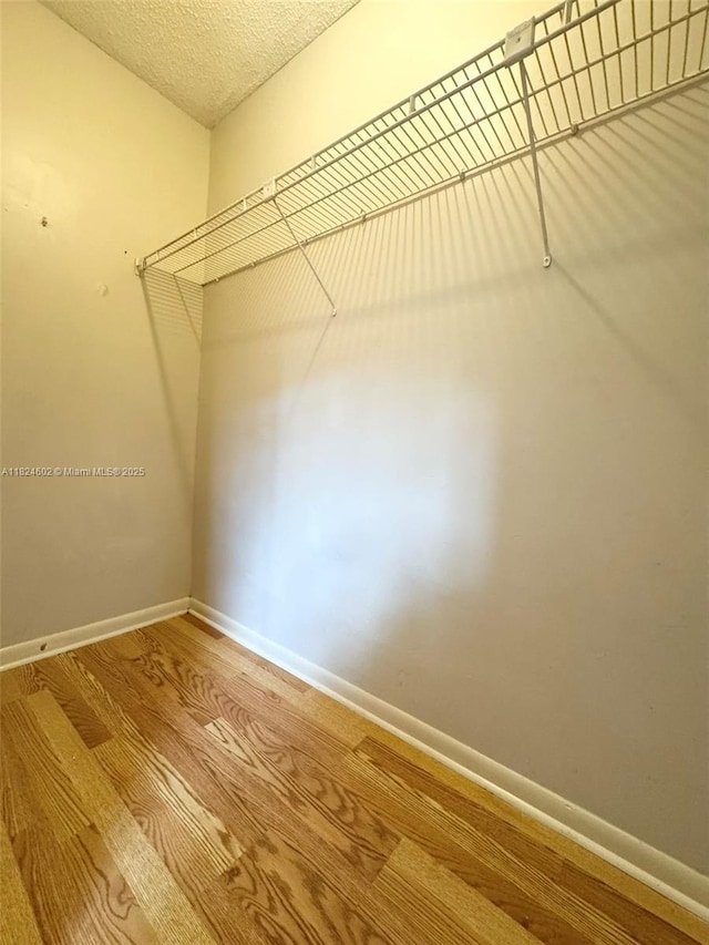 2562 NW 52nd Ave Unit B18, Lauderhill, FL 33313 - spacious closet with wood finished floors