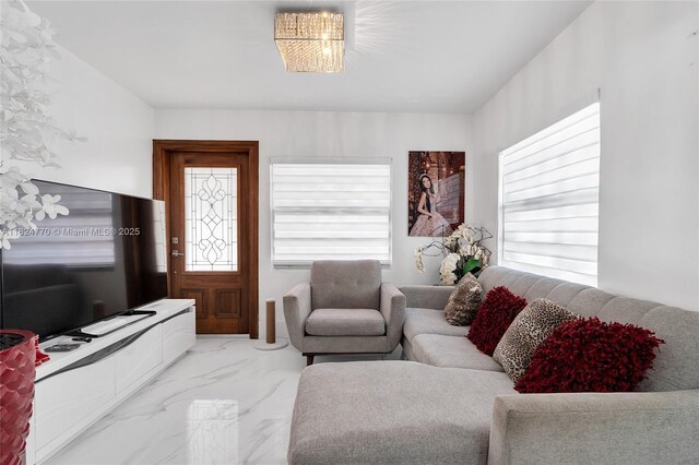 31 SW 58th Ct, Miami, FL 33144 - living room with healthy amount of natural light and marble finish flooring
