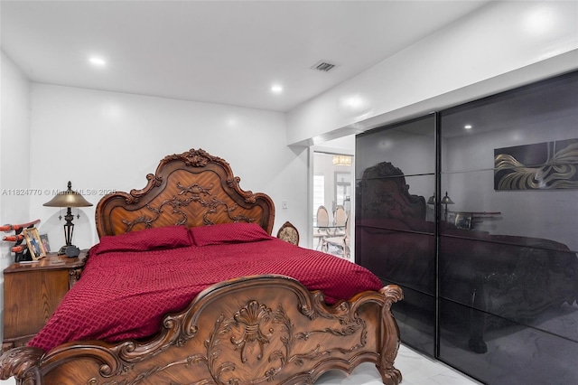 31 SW 58th Ct, Miami, FL 33144 - bedroom featuring marble look tile flooring and recessed lighting