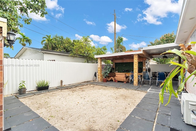 31 SW 58th Ct, Miami, FL 33144 - fenced backyard with a patio