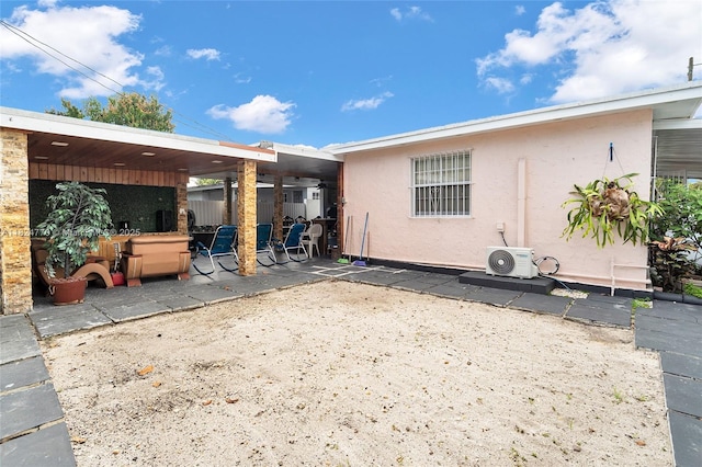 31 SW 58th Ct, Miami, FL 33144 - rear view of property with a patio and stucco siding