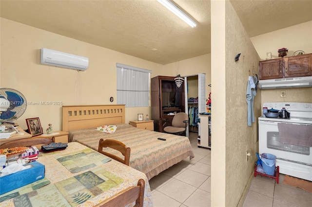 31 SW 58th Ct, Miami, FL 33144 - bedroom with an AC wall unit, light tile patterned flooring, and a textured ceiling
