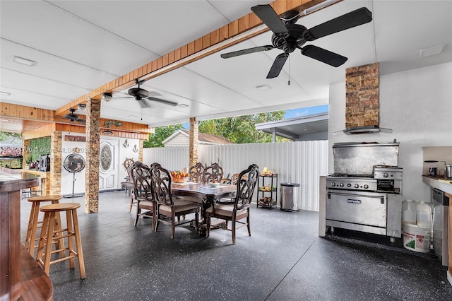 31 SW 58th Ct, Miami, FL 33144 - view of patio / terrace featuring a ceiling fan, exterior bar, outdoor dining area, washer and clothes dryer, and area for grilling