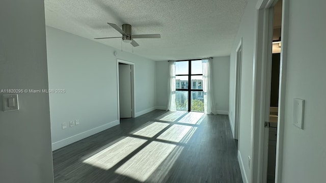 2075 SW 122nd Ave Unit 531, Miami, FL 33175 - spare room with a textured ceiling, wood finished floors, and ceiling fan