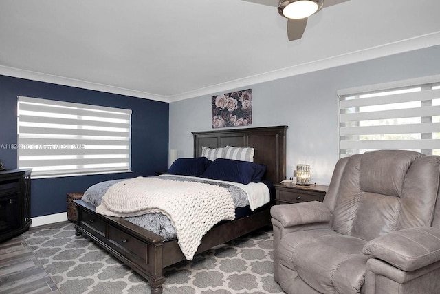 104500 Overseas Hwy, Key Largo, FL 33037 - bedroom with ornamental molding, wood finished floors, and ceiling fan