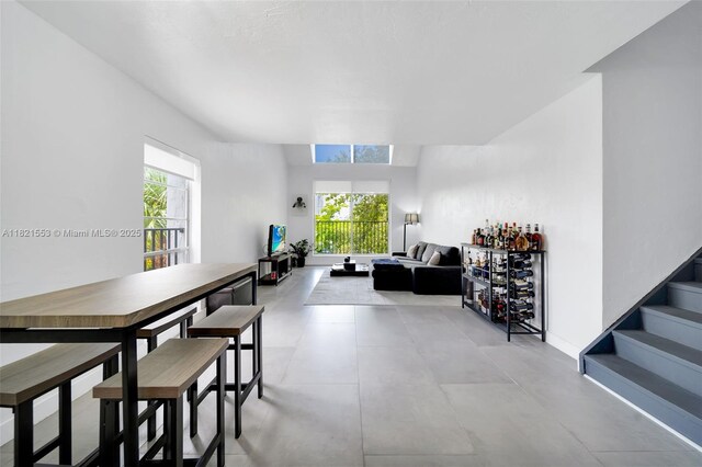 6900 N Kendall Dr Unit A303, Pinecrest, FL 33156 - dining space with plenty of natural light and stairs