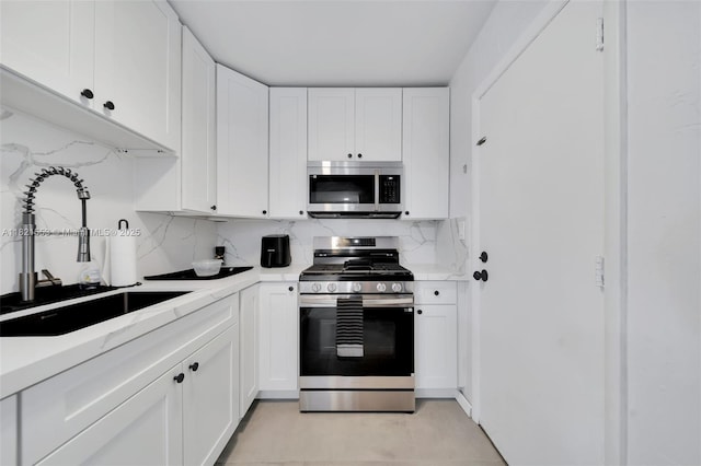6900 N Kendall Dr Unit A303, Pinecrest, FL 33156 - kitchen featuring appliances with stainless steel finishes and white cabinets