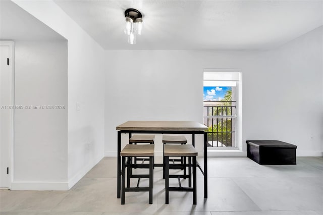 6900 N Kendall Dr Unit A303, Pinecrest, FL 33156 - dining area with baseboards
