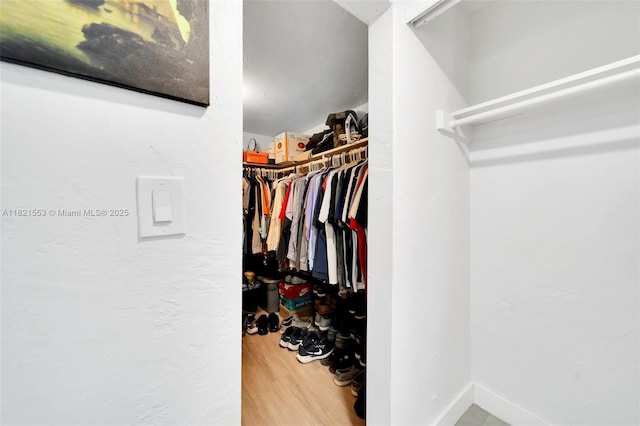 6900 N Kendall Dr Unit A303, Pinecrest, FL 33156 - walk in closet featuring wood finished floors