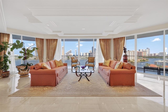 2800 Island Blvd Unit 1505, Aventura, FL 33160 - living room featuring a view of skyline, a raised ceiling, plenty of natural light, and a water view