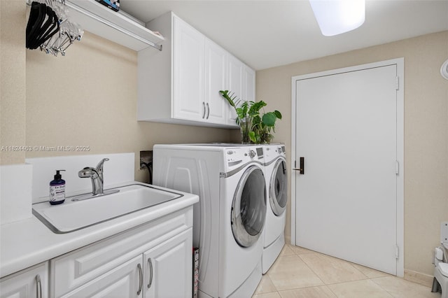 2800 Island Blvd Unit 1505, Aventura, FL 33160 - laundry area featuring cabinet space, washing machine and dryer, and light tile patterned flooring