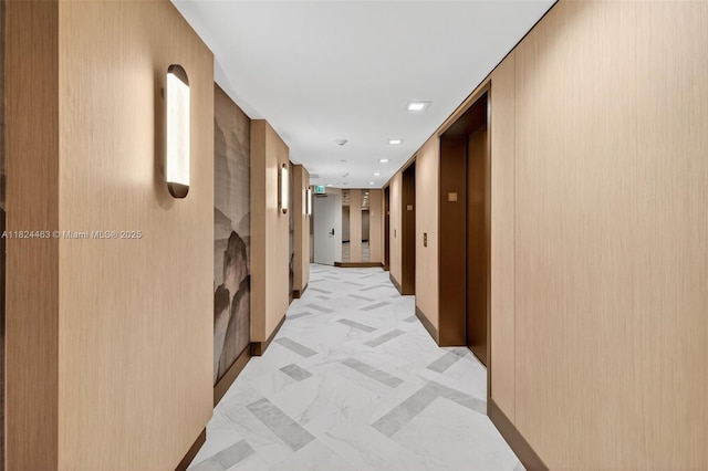 2800 Island Blvd Unit 1505, Aventura, FL 33160 - corridor with elevator, light marble finish floors, and recessed lighting