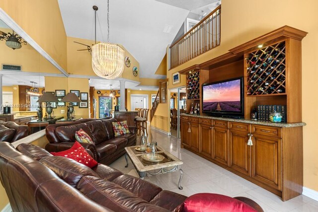 10091 SW 137th Pl, Miami, FL 33186 - living room with decorative columns and high vaulted ceiling