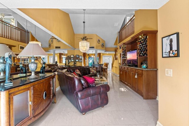 10091 SW 137th Pl, Miami, FL 33186 - living area featuring light marble finish floors and vaulted ceiling