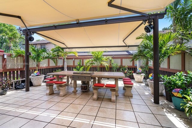 10091 SW 137th Pl, Miami, FL 33186 - view of patio featuring outdoor dining space