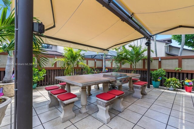 10091 SW 137th Pl, Miami, FL 33186 - view of patio / terrace featuring outdoor dining space