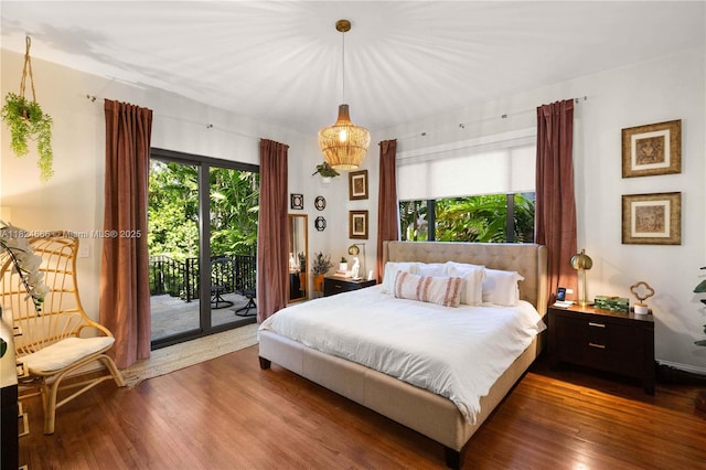1460 Mantua Ave, Coral Gables, FL 33146 - bedroom featuring access to exterior and wood finished floors