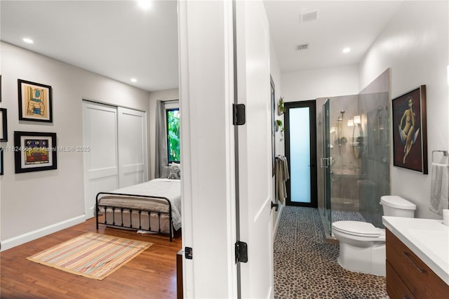 1460 Mantua Ave, Coral Gables, FL 33146 - bathroom with vanity, a shower stall, wood finished floors, and recessed lighting