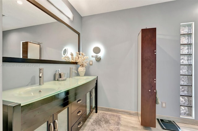 501 SE 7th Ave, Pompano Beach, FL 33060 - full bathroom with double vanity and wood finished floors