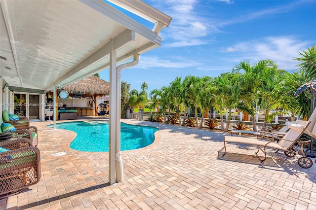 501 SE 7th Ave, Pompano Beach, FL 33060 - view of pool featuring a jacuzzi and a patio area